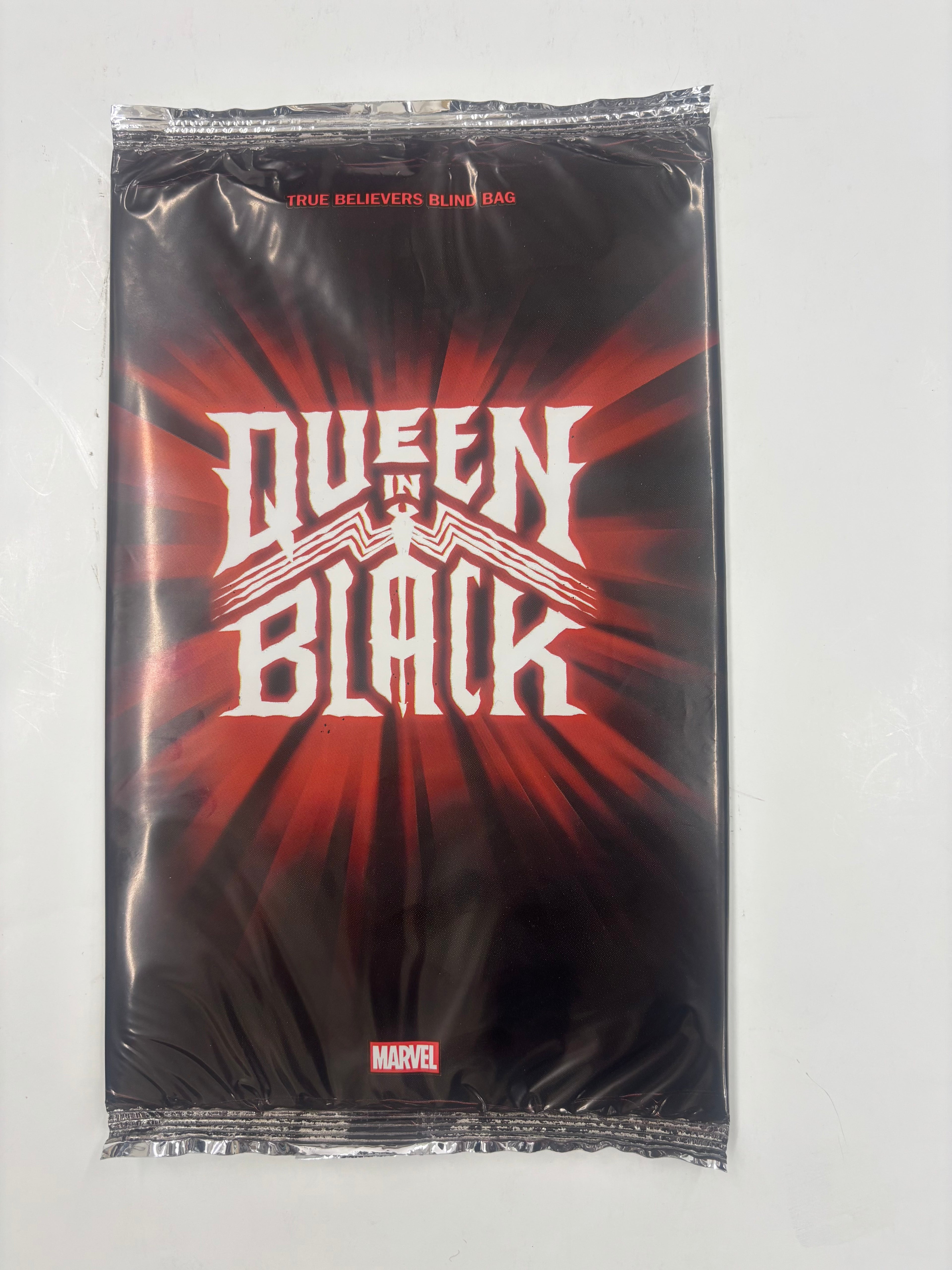 Queen in black blind bag