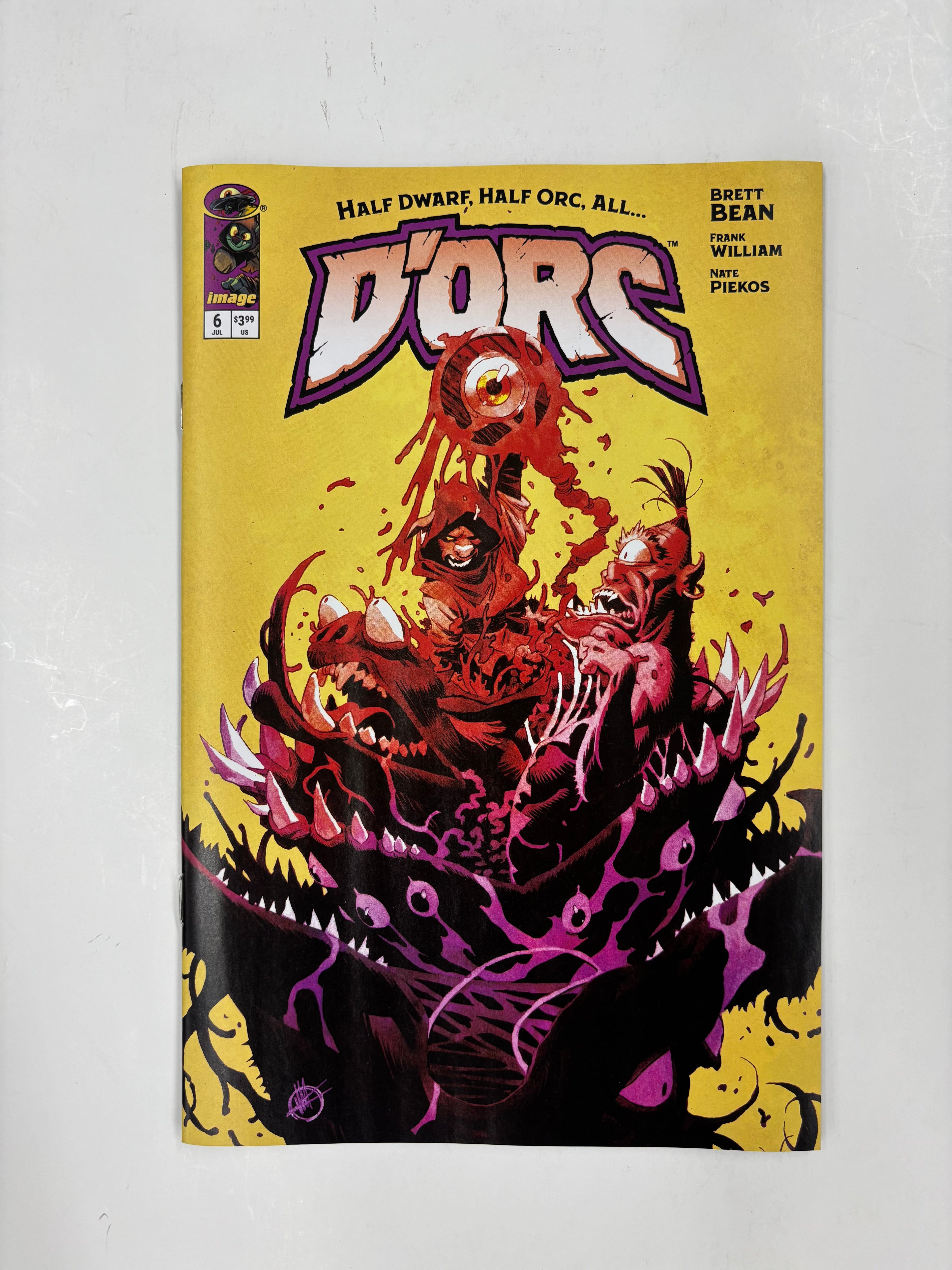 D’ORC #6 cover B yellow pink red cover