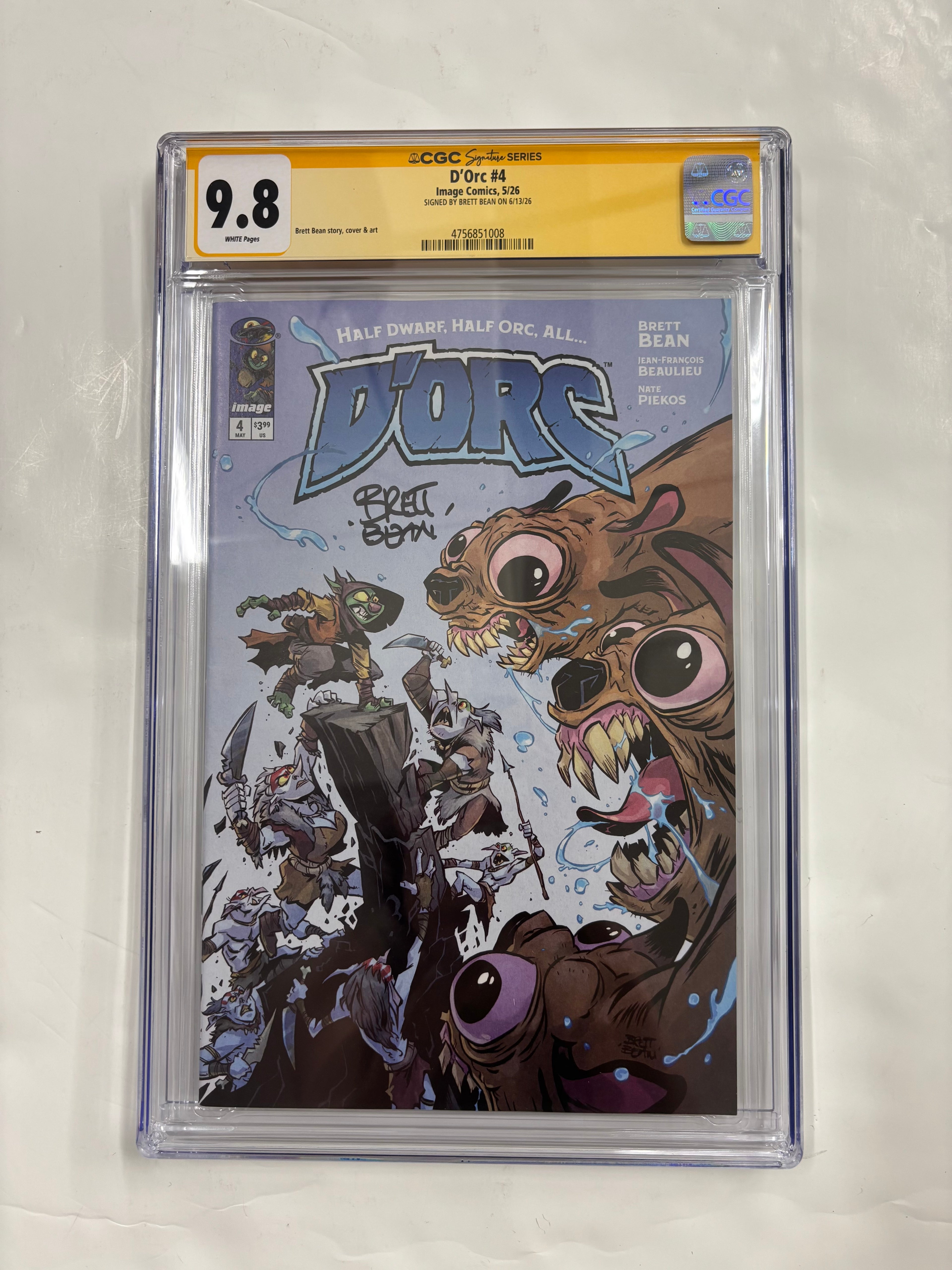 Yellow slab cgc 9.8 D’ORC #4 signed by Brett bean
