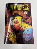PREORDER: OTTLEY SIGNED Invincible #1 foil bloody color variant