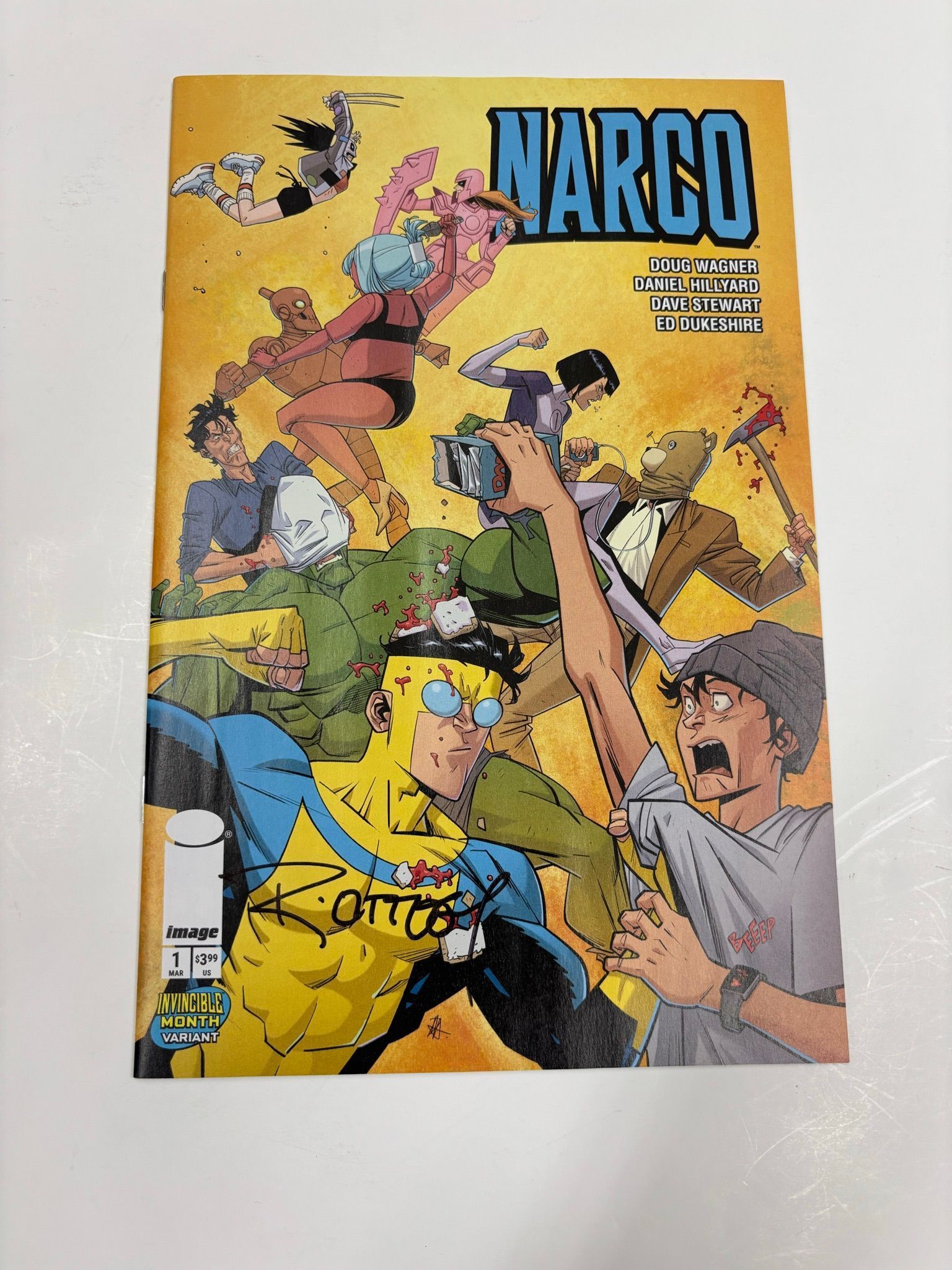 Narco #1 invincible month variant signed by Ryan Ottley